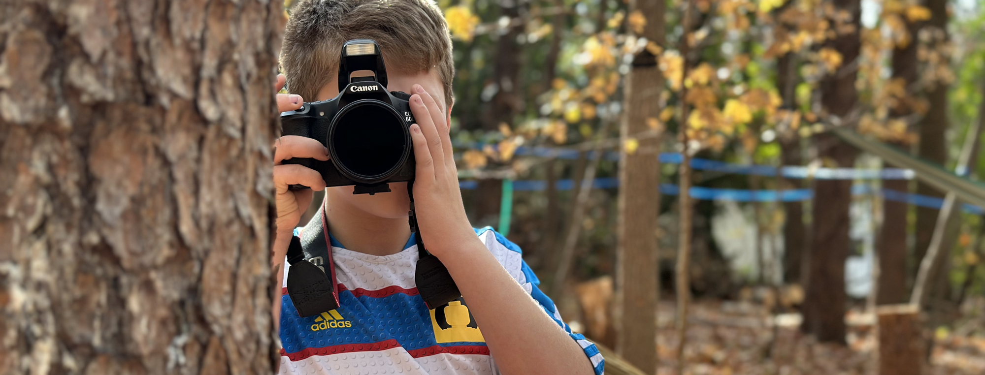 boy taking photographs