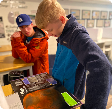 student reading textbook