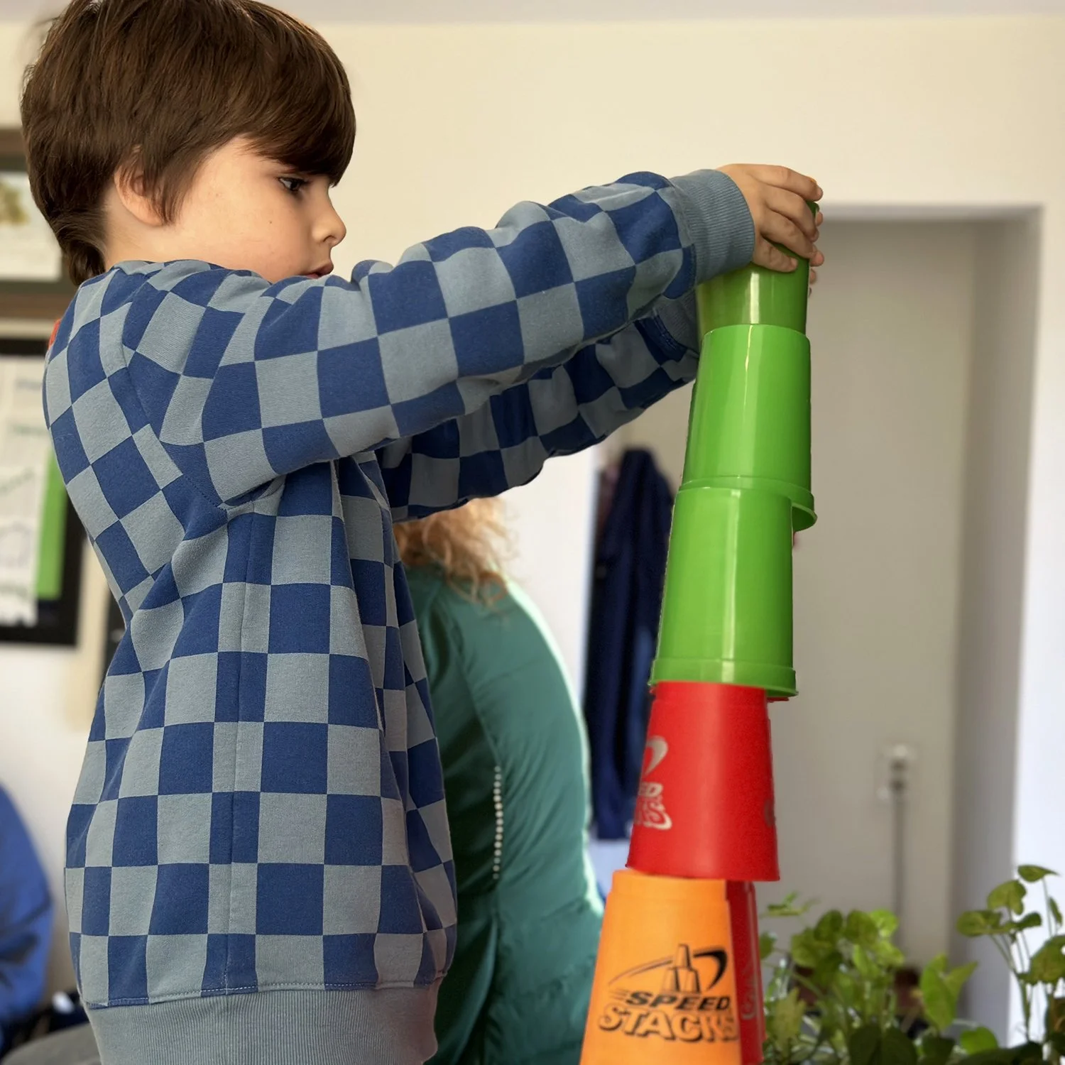 child stacking cups