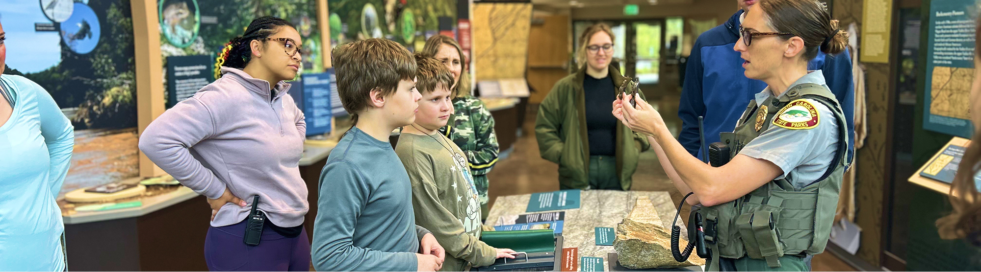 ranger showing nature to students 