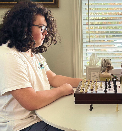 student playing chess